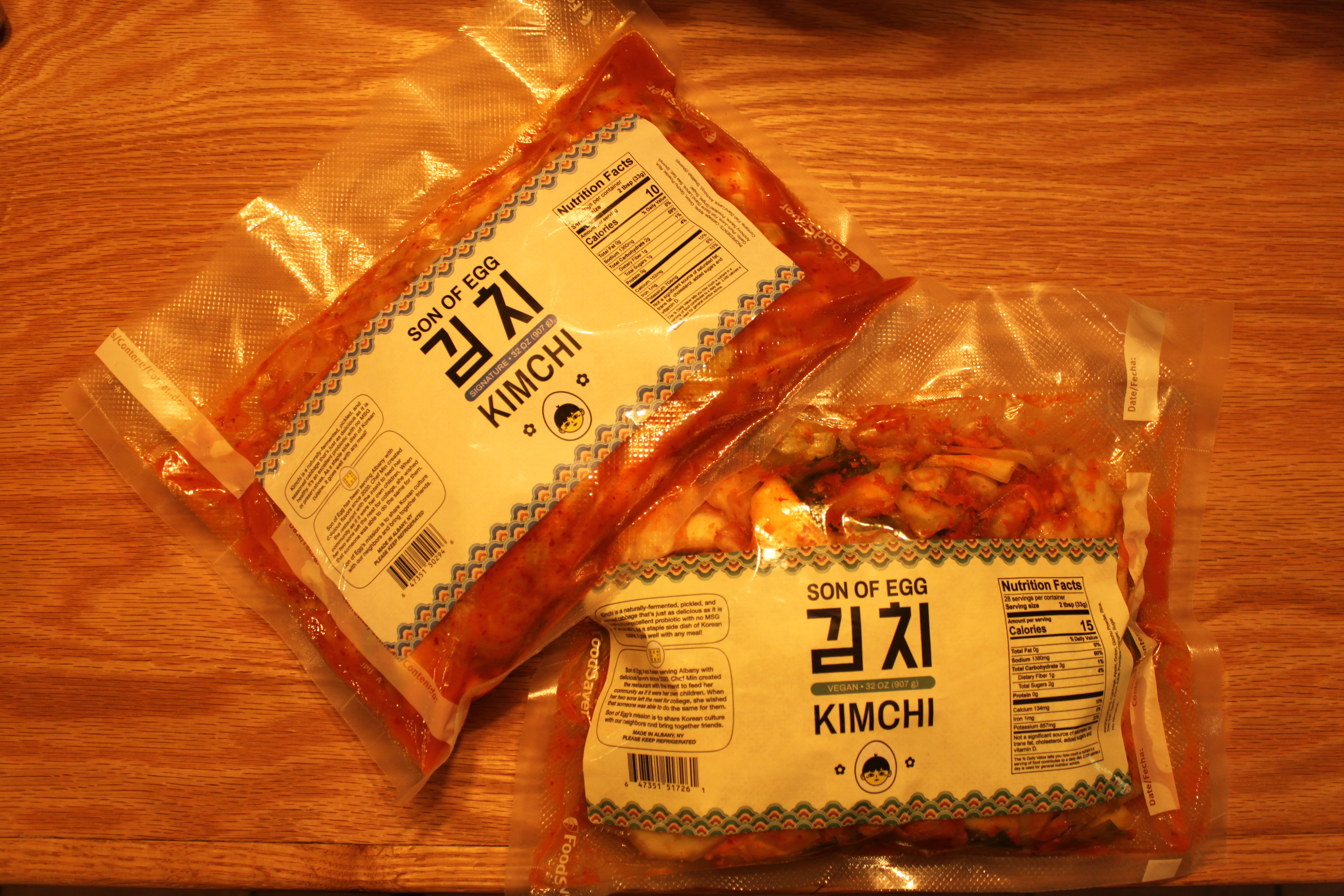 Son of Egg Signature and Vegan Kimchi vacuum-sealed packs with nutrition labels